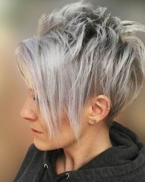 Long pixie cut with long bangs with grey balayage