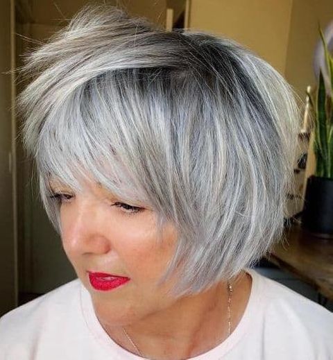 Grey color layered short bob with bangs in 2021-2022