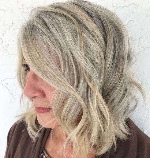 Mid-length wavy hairstyle for women over 60