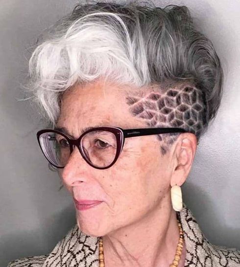 Side design undercut short hairstyle for women with glasses
