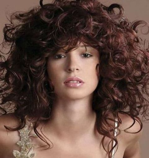 Voluminous mid-length curly hair for women 2021-2022