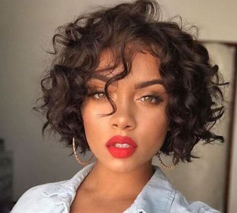 Curly short hairstyle with bangs for black women