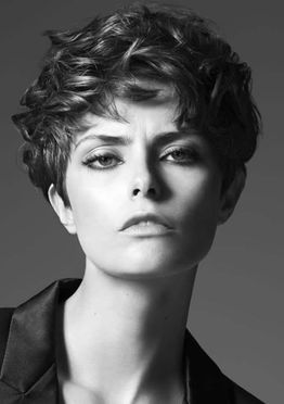Short layered pixie hair style for women